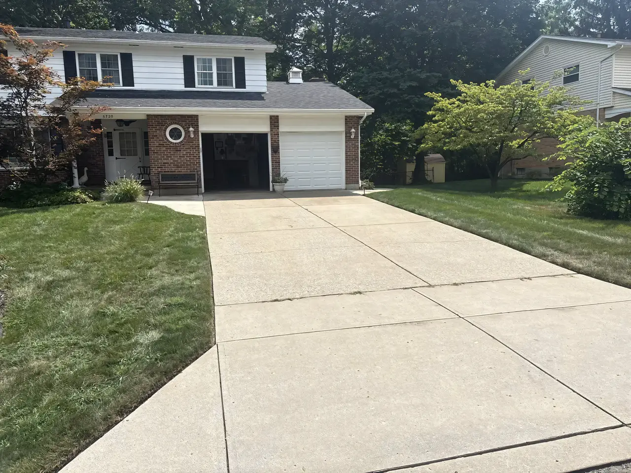 Cleaned driveway from an angle — uniform clean finish across the entire slab