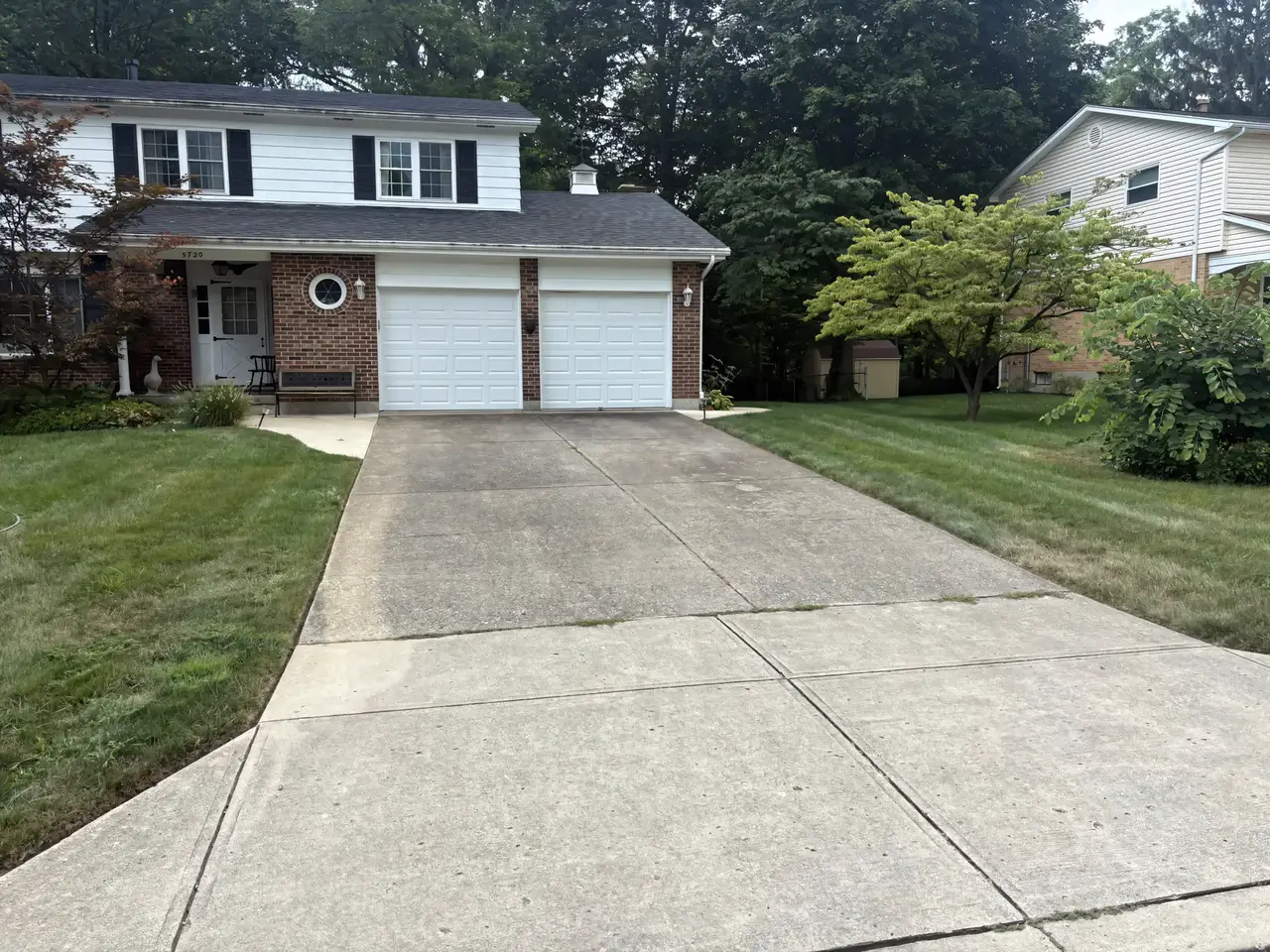Cleaned driveway — wide shot showing the full surface restored to original color