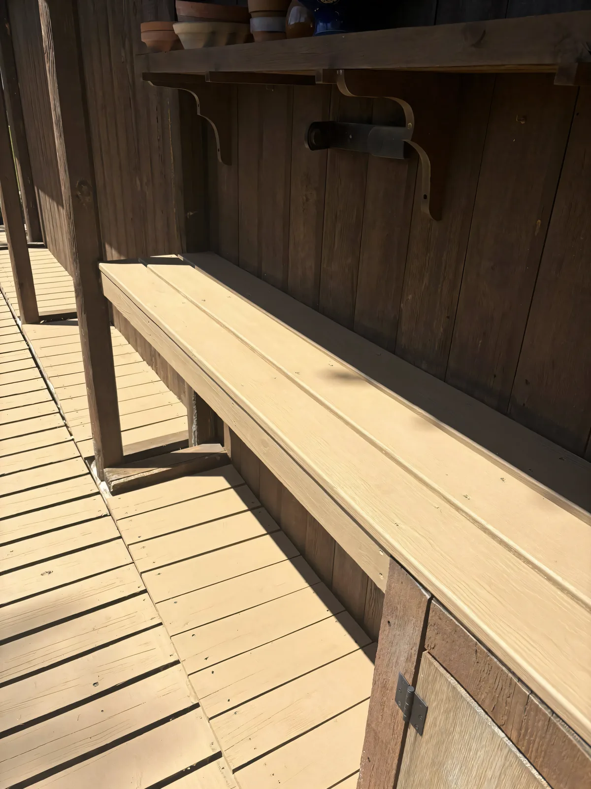 Wood deck boards after cleaning — gray weathering removed, grain restored
